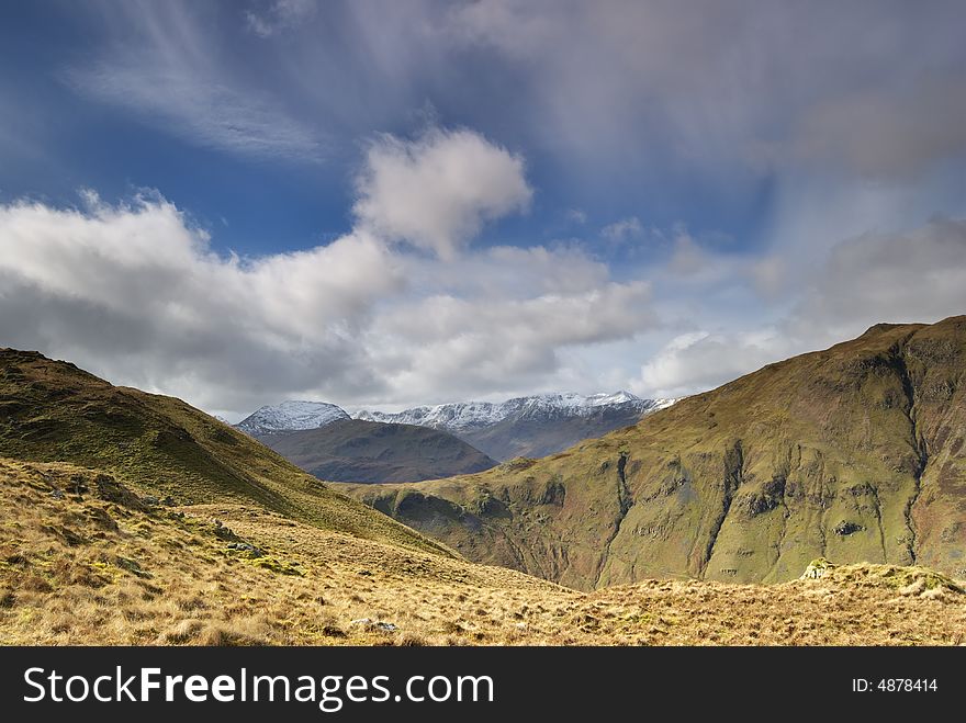 A distant view of the snow capped Helvellyn range from beda fell in the English Lake District