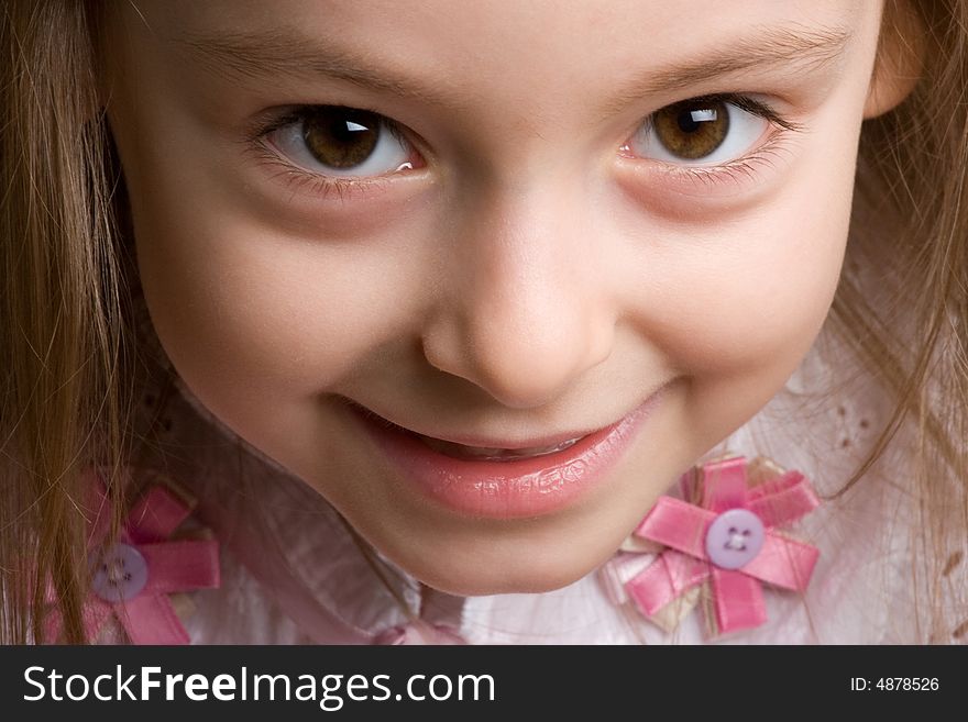 Close-up portrait of cute little girl