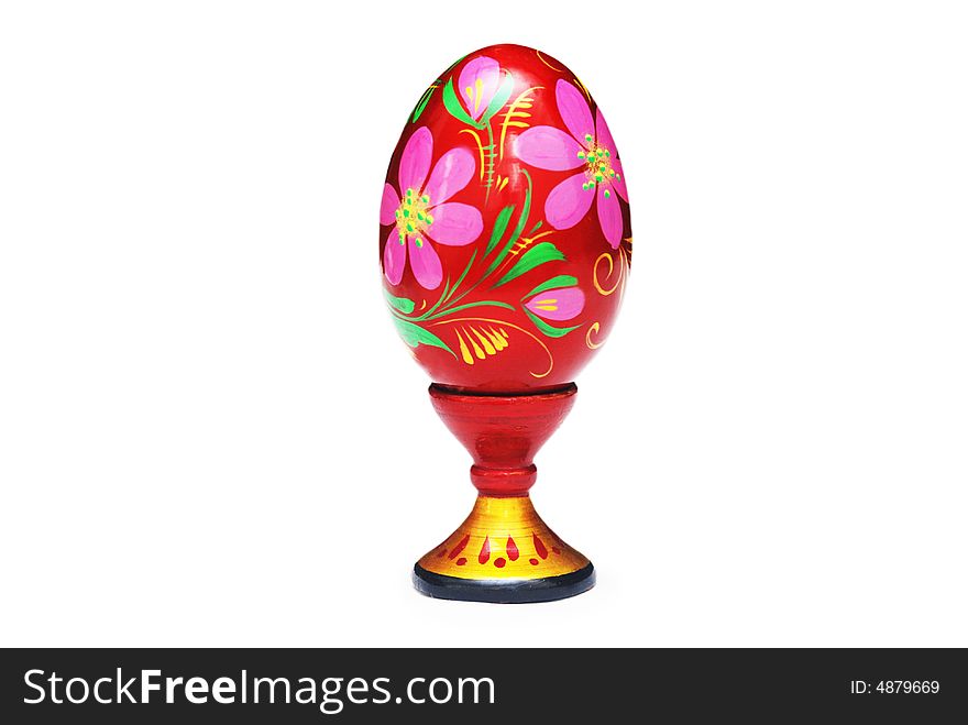 Colored cup on eggcup isolated on white