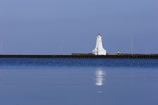 Lighthouse On End Of A Pier Stock Image