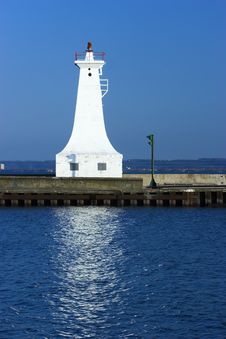 White Lighthouse On A Pier Stock Photography