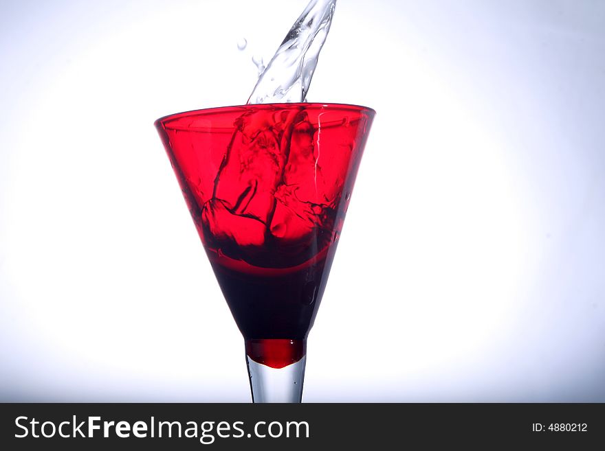 A nice red glass with water