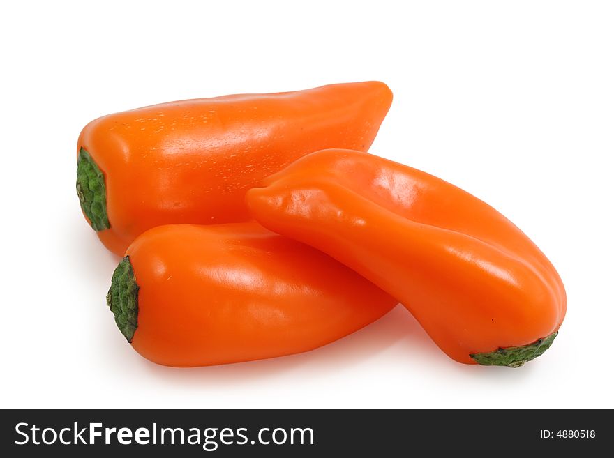 Orange paprika on white background