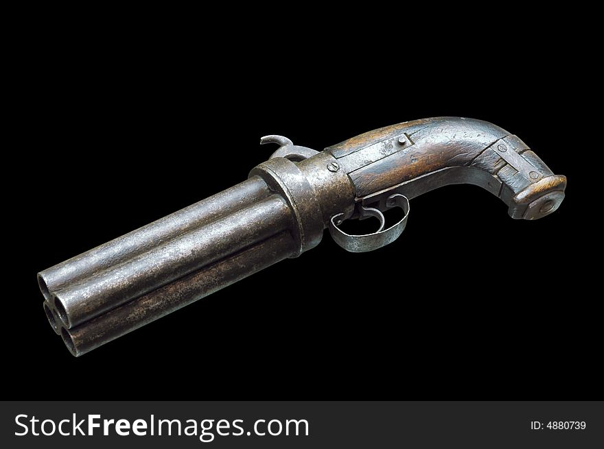 Musket with four trunks isolated on black