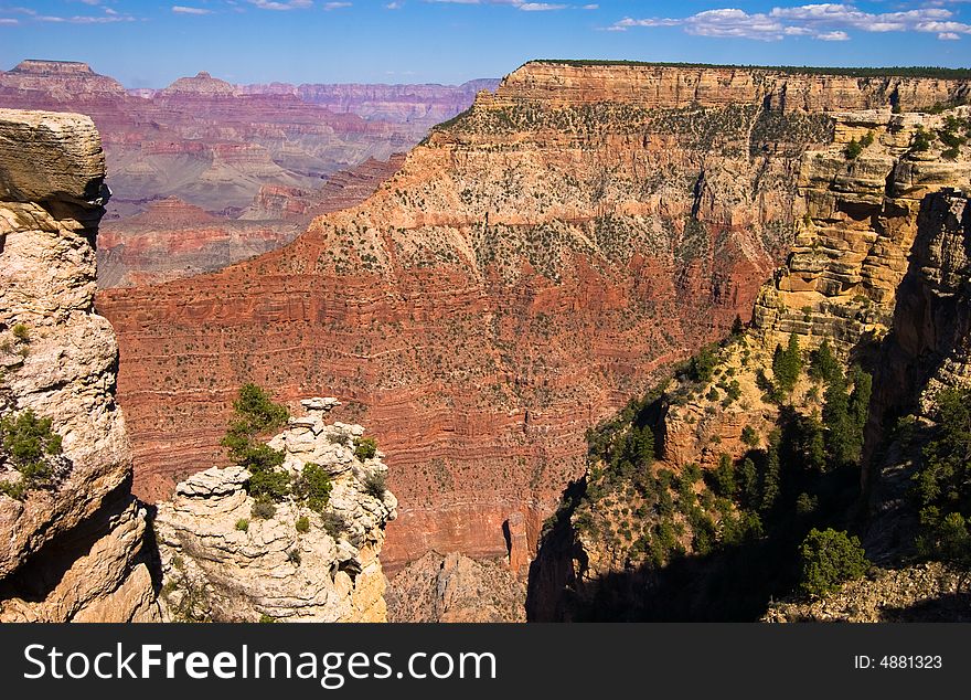 Overview of a Grand Canyon valley framed by rocks