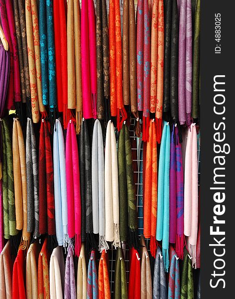 Multiple coloured scarf hanged together