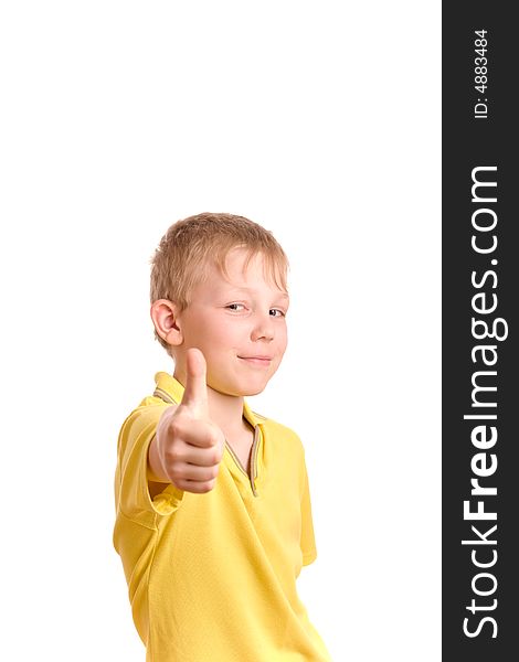 Photo of smiling teenager giving a rather enthusiastic thumbs up sign. Photo of smiling teenager giving a rather enthusiastic thumbs up sign.