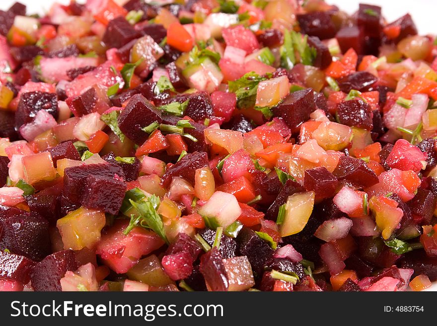 Abstract background from appetizing, tasty beetroot  (russian) salad. Abstract background from appetizing, tasty beetroot  (russian) salad