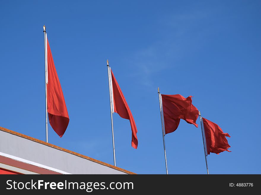 Red flags with blue sky