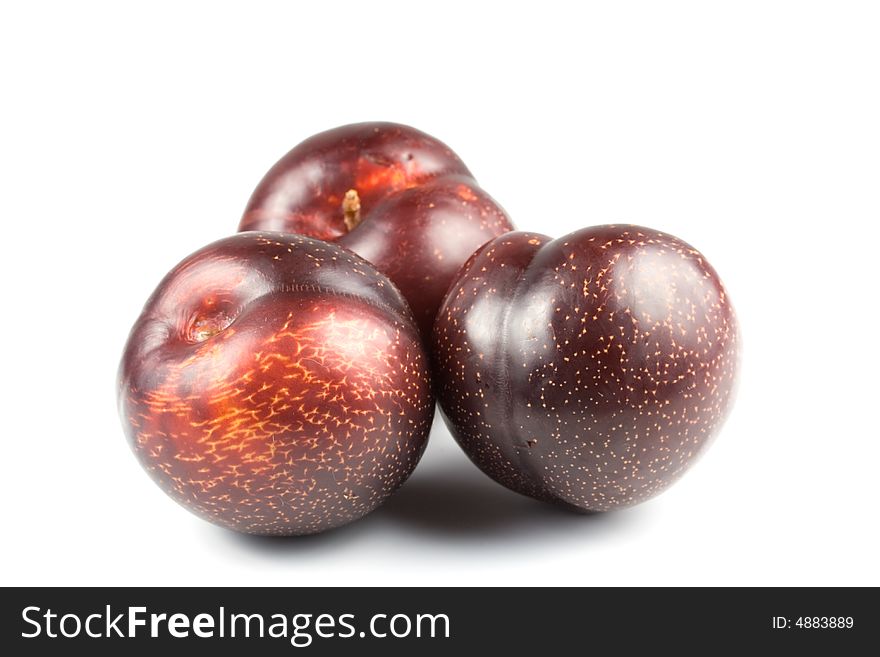 Plum On A White Background
