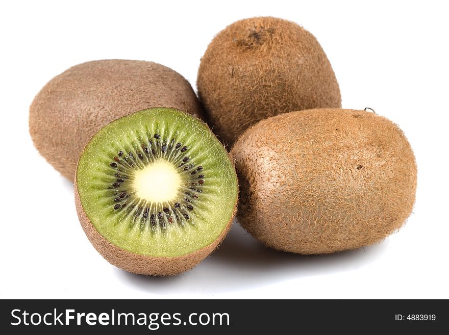 Ripe appetizing kiwi fruits isolated on a white background. Ripe appetizing kiwi fruits isolated on a white background