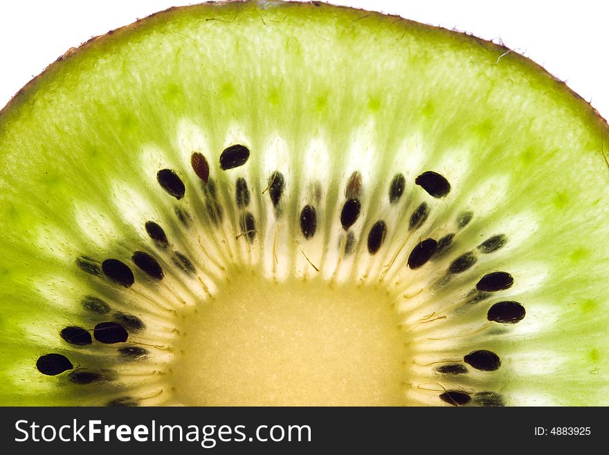 Sliced kiwi close up. Isolated on a white background. Sliced kiwi close up. Isolated on a white background.