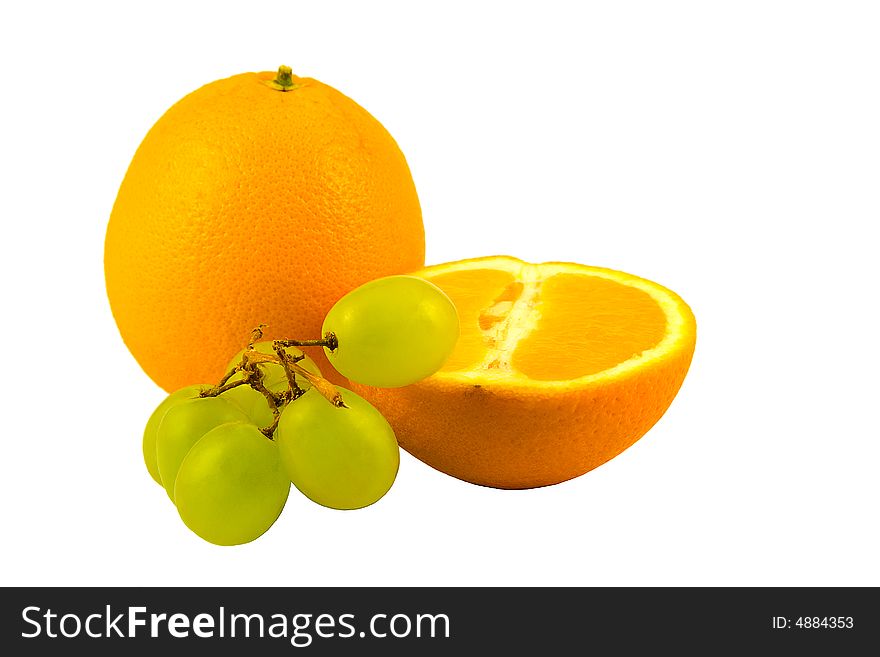 A whole and a half of orange with grape, isolated. A whole and a half of orange with grape, isolated