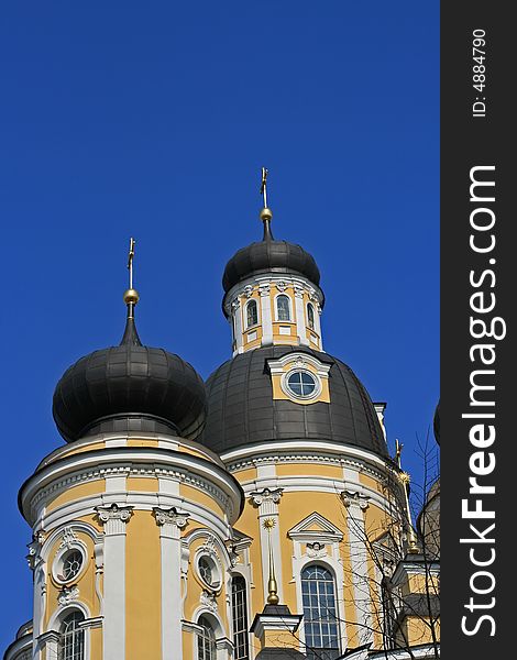 Domes of orthodox church on a blue sky background. St.Petersburg, Russia