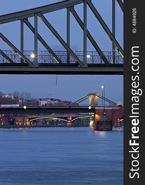 Historical pedestrial bridge on the river Main in Frankfurt at night. Historical pedestrial bridge on the river Main in Frankfurt at night.