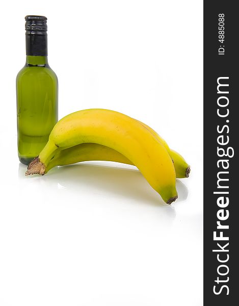 Bananas and white wine isolated on white background. Bananas and white wine isolated on white background