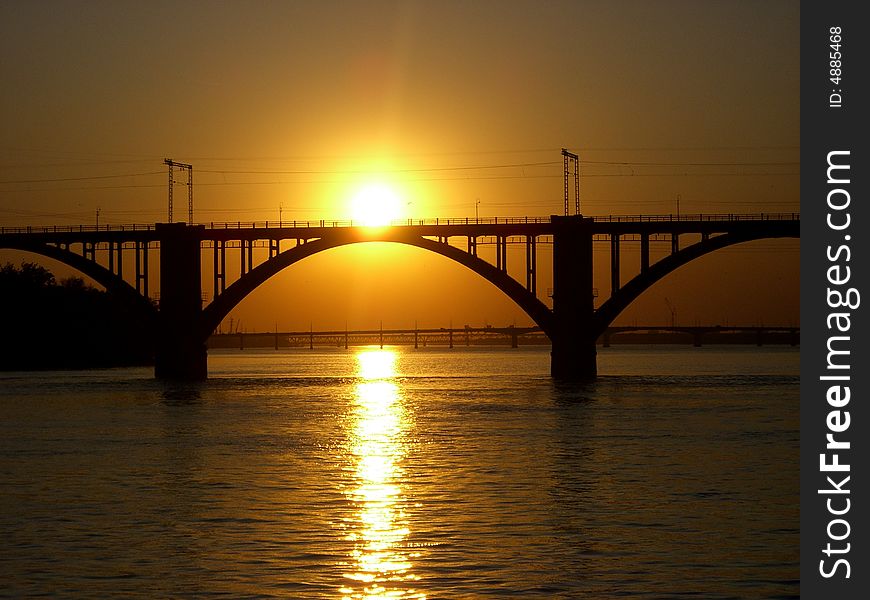 River under soft sunset beams