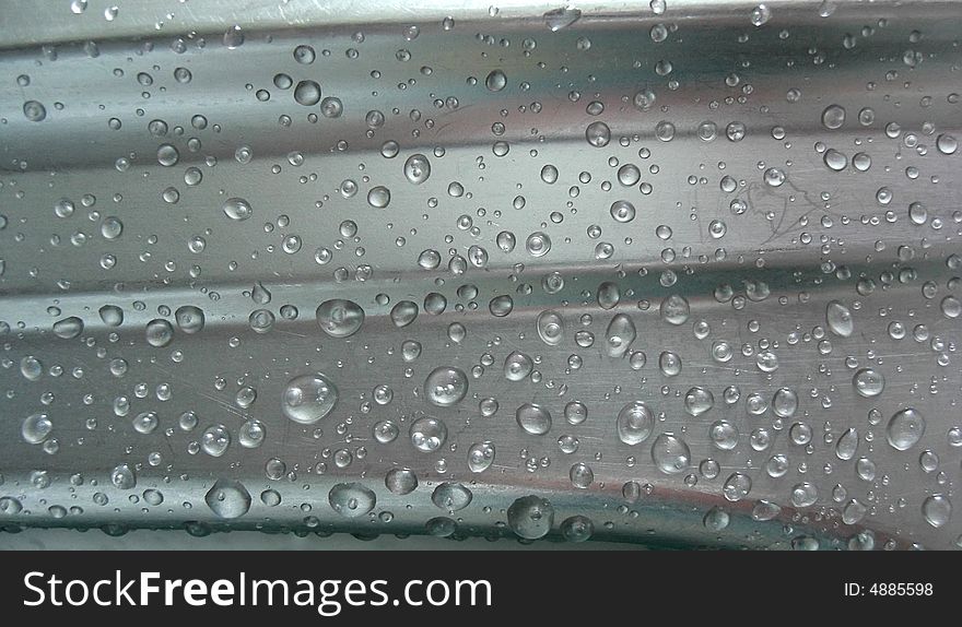 Water drops on gray metall. Water drops on gray metall.