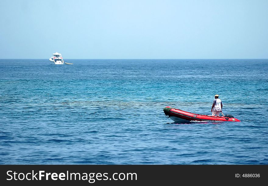 Boat on deep blue the sea. Boat on deep blue the sea