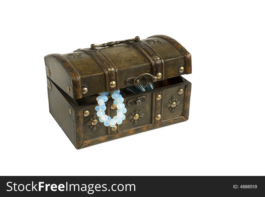 Isolated oriental wooden box with jewelry on a white background. Isolated oriental wooden box with jewelry on a white background