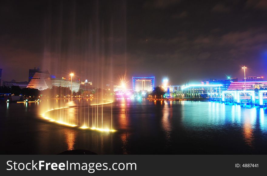 The night falls, Dongguan square all around neon twinkle, even has illuminated the sky white clouds, in the artificial lake eruptive fountain is dancing along with music, a school of happy auspicious metropolis character and style. The night falls, Dongguan square all around neon twinkle, even has illuminated the sky white clouds, in the artificial lake eruptive fountain is dancing along with music, a school of happy auspicious metropolis character and style.