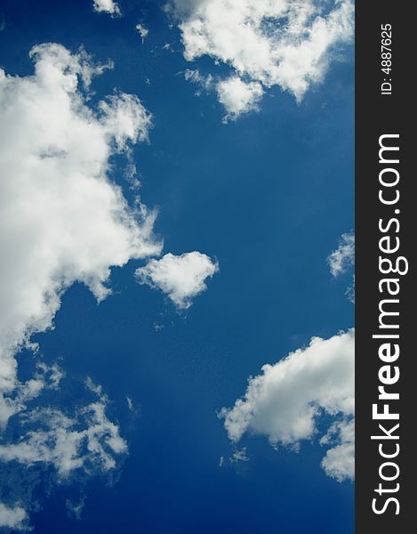 Sunny sky background with clouds