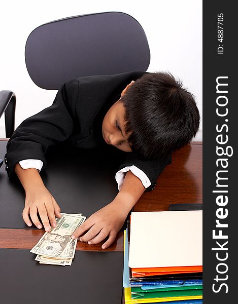 Young executive man getting tired counting money