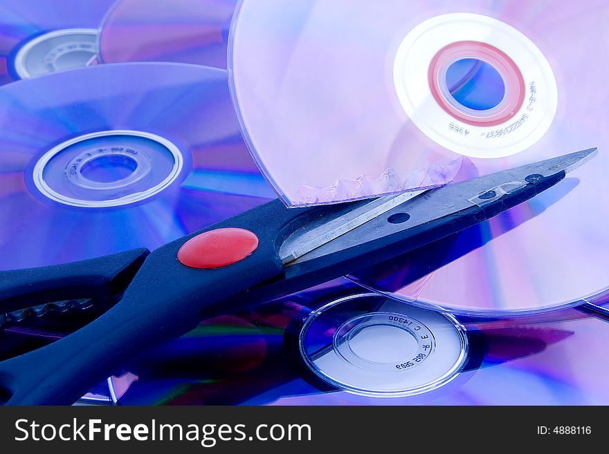 Scissors, cutting dvd disc, blue. Scissors, cutting dvd disc, blue