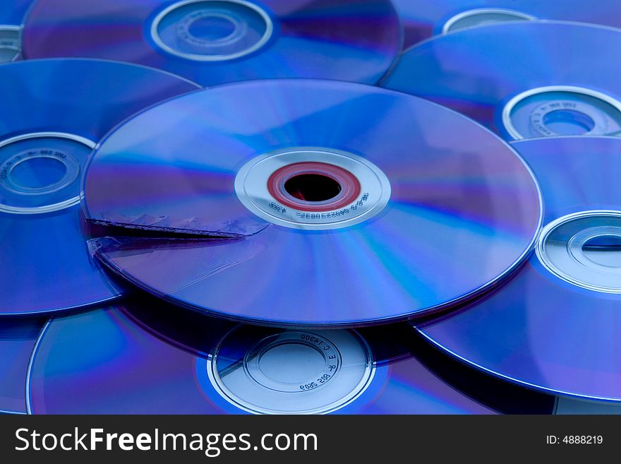 A few dvd discs with the damaged one. A few dvd discs with the damaged one