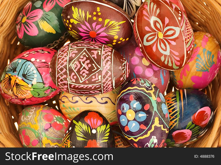 Easter eggs in willow basket. Easter eggs in willow basket