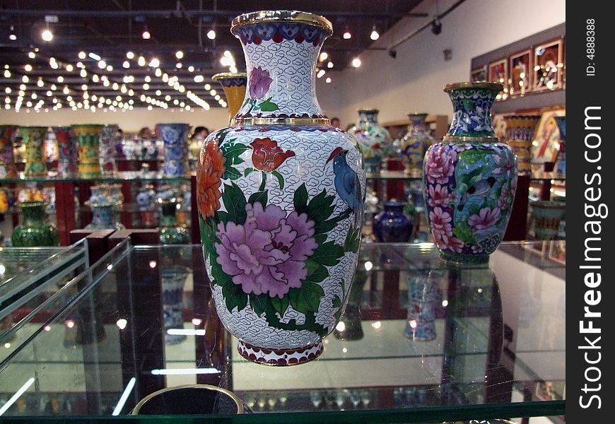A chinese vase on display in a shop