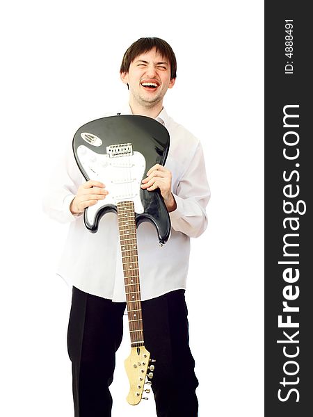 Young man with electric guitar over white. Young man with electric guitar over white