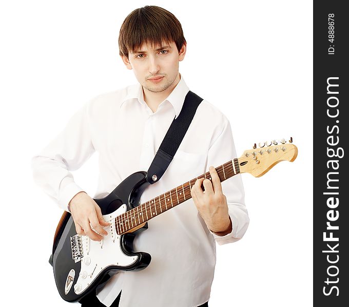 Young man with guitar isolated on white