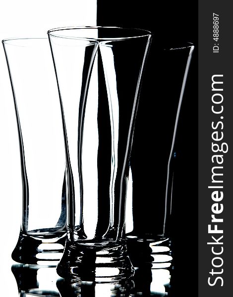 Still life with glasses on the black and white background