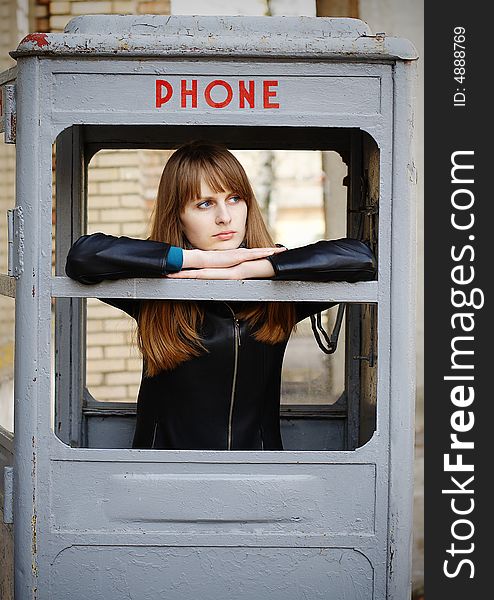 Lonely Girl In Old Phonebox