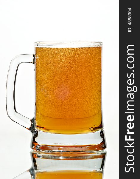 Beer in glass on the white background