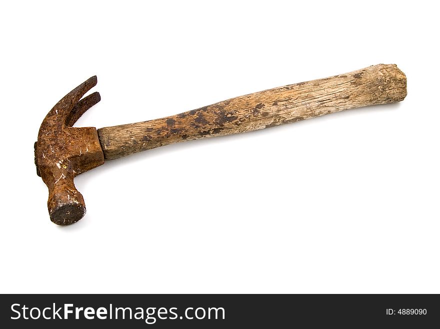 Battered old hammer with rusty claw and weathered wooden handle, isolated on a white background with clipping path included.
