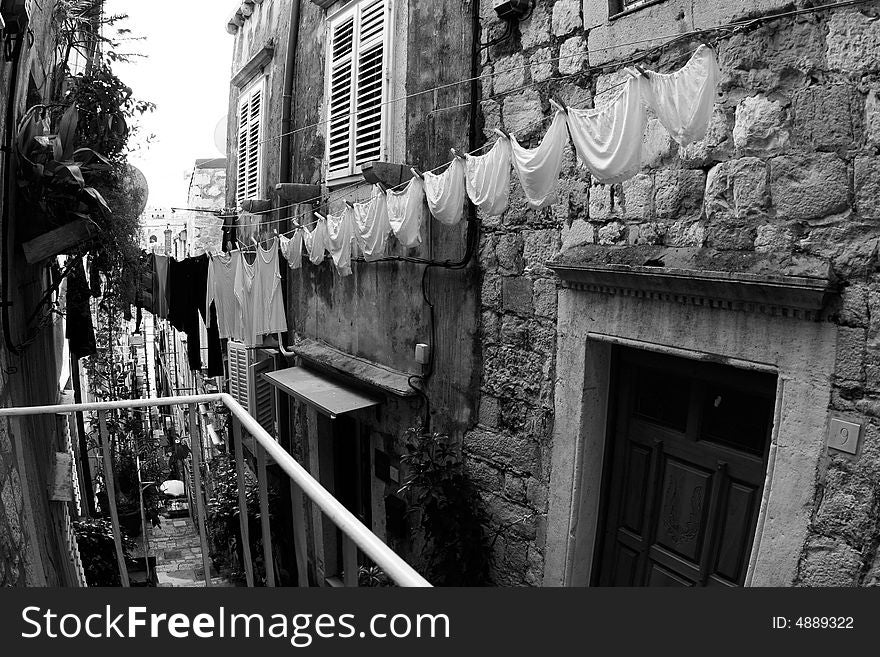 A clothesline of laundry drying. (Dubrovnik, Croatia). A clothesline of laundry drying. (Dubrovnik, Croatia)