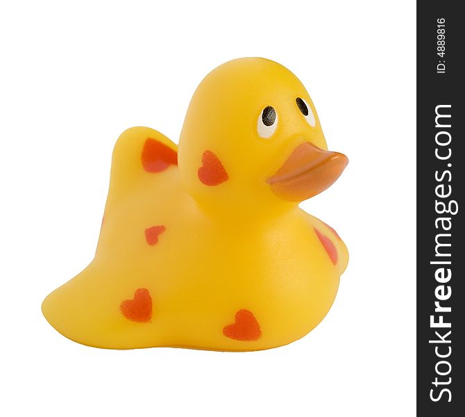 Yellow rubber duck with red hearts, isolated on a white background