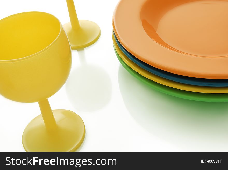 Yellow Glasses And Color Ceramics Dishes