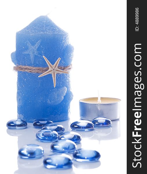 Candles and blue glass  stones