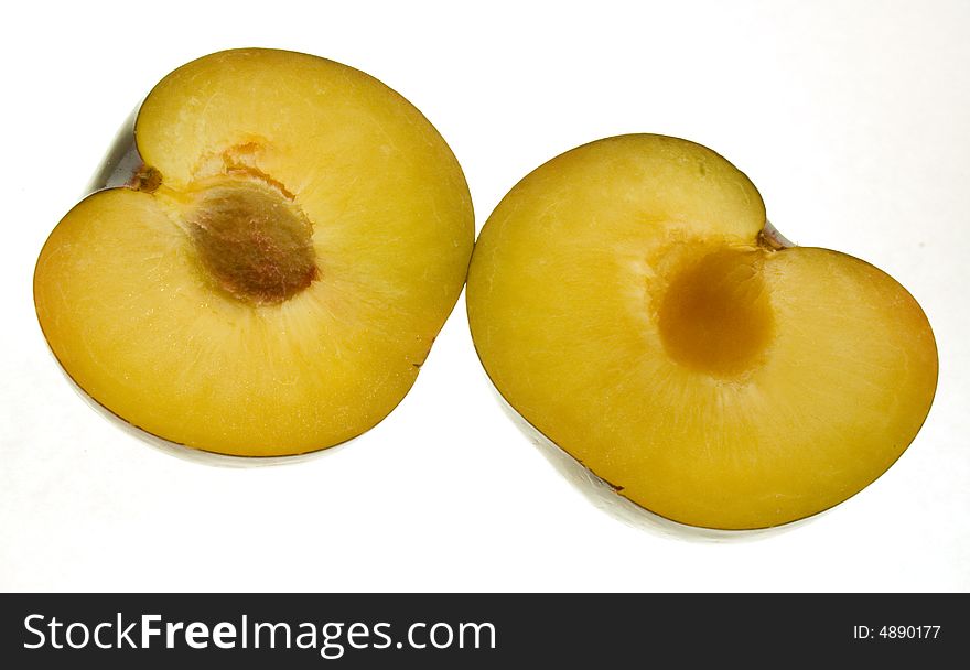 Plum cut in half