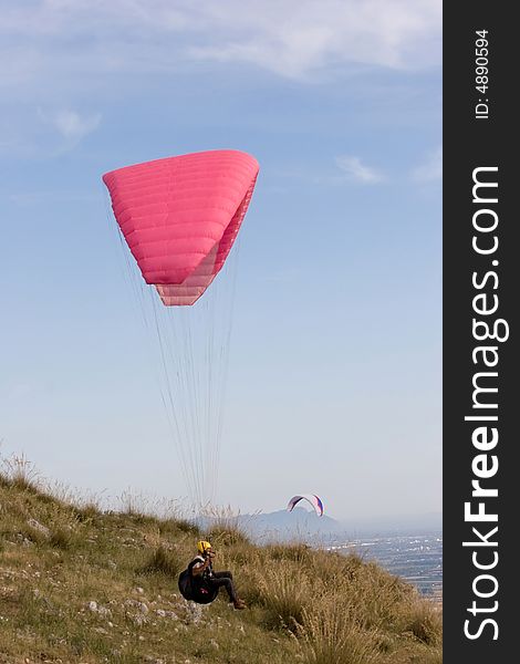 Alone over the plains while paragliding. Alone over the plains while paragliding