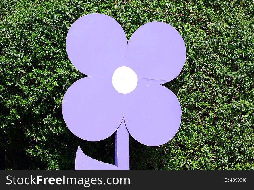 Cutout of a large flower depicting a flower yard