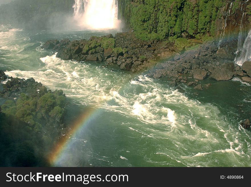 Iguazu river rapids, and a rainbow. Iguazu river rapids, and a rainbow