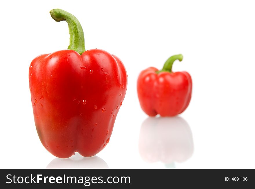 A red bell pepper with water drops. A red bell pepper with water drops