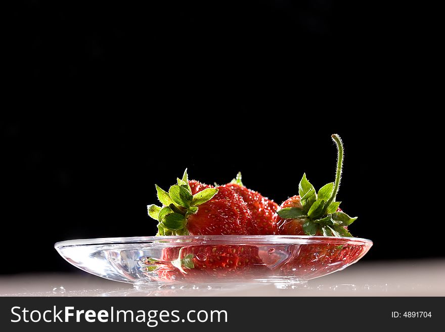 Food series: fresh ripe red strawberry on the plate