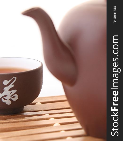 Brown solemnity Chinese teapot without a background. Brown solemnity Chinese teapot without a background