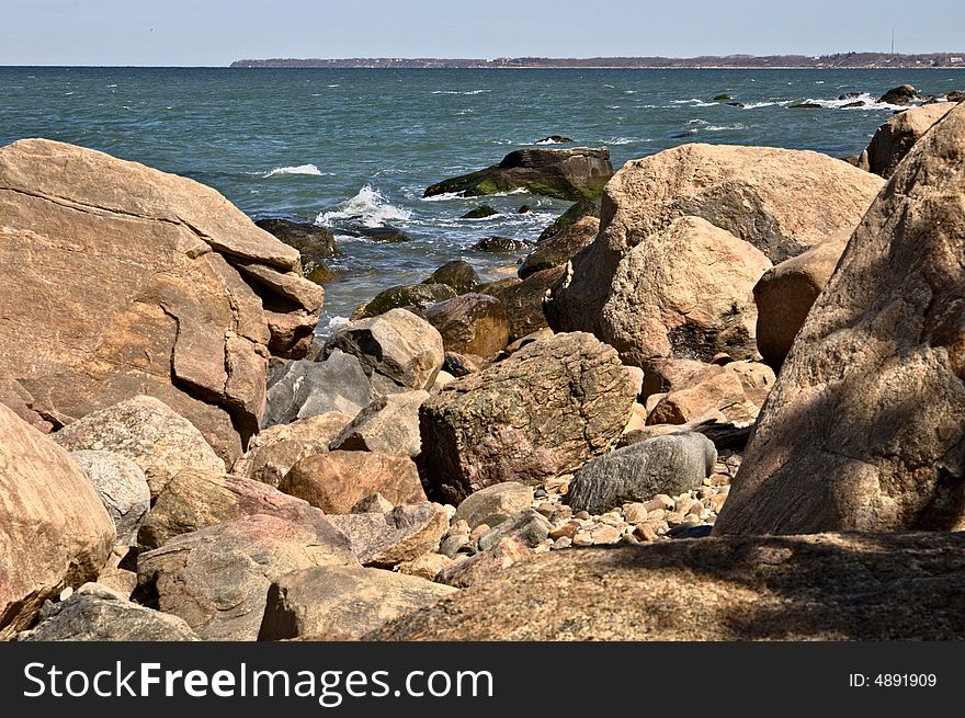 A very rocky ocean beach.  View from the North shore of Long Island. A very rocky ocean beach.  View from the North shore of Long Island.