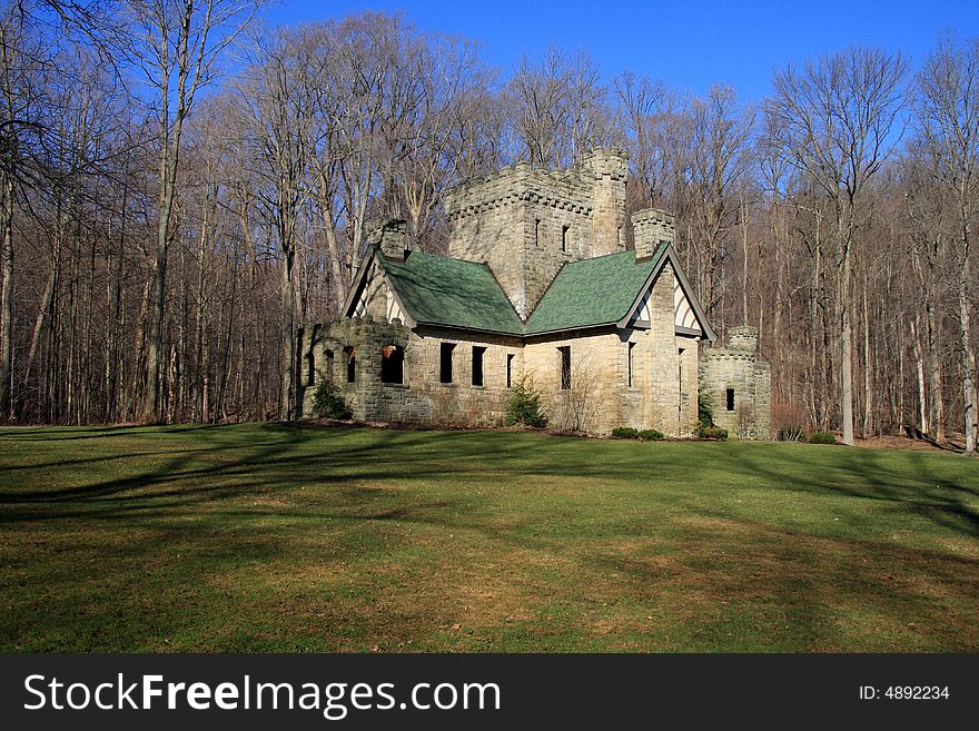 Stone castle on the edge of the woods